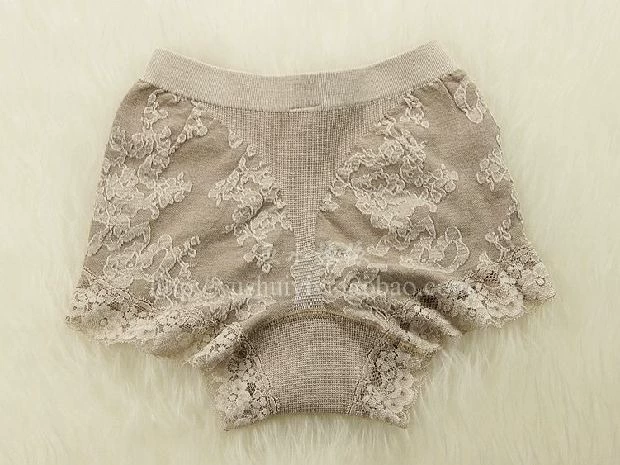 Quần lót nữ jacquard ba chiều vải cotton viền ren gợi cảm liền mạch túi giữa eo quần đùi quần đùi - Tam giác