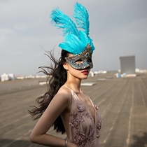 Swallowtail butterfly lady half face blue feather mask masquerade party Masked Singer