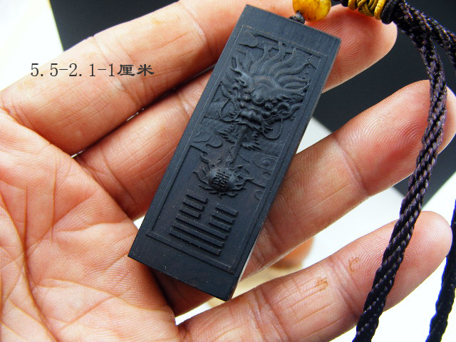Ditiantai ebony wood carving pendant