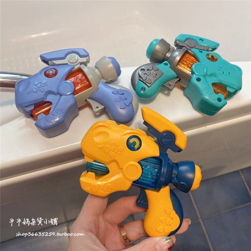 Shakyung explosion Children's baby hand with mini-baby baby dinosaur sound and light small pistol pocket toy portable