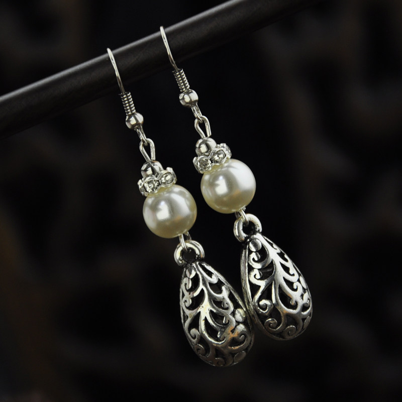 Vintage pearl colored diamond Miao silver hollow water drop earrings female models drop earrings Korean style temperament ethnic style gift pendant