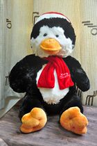 The outer single is soft and chubby the Christmas fat penguin plush paparazzi.