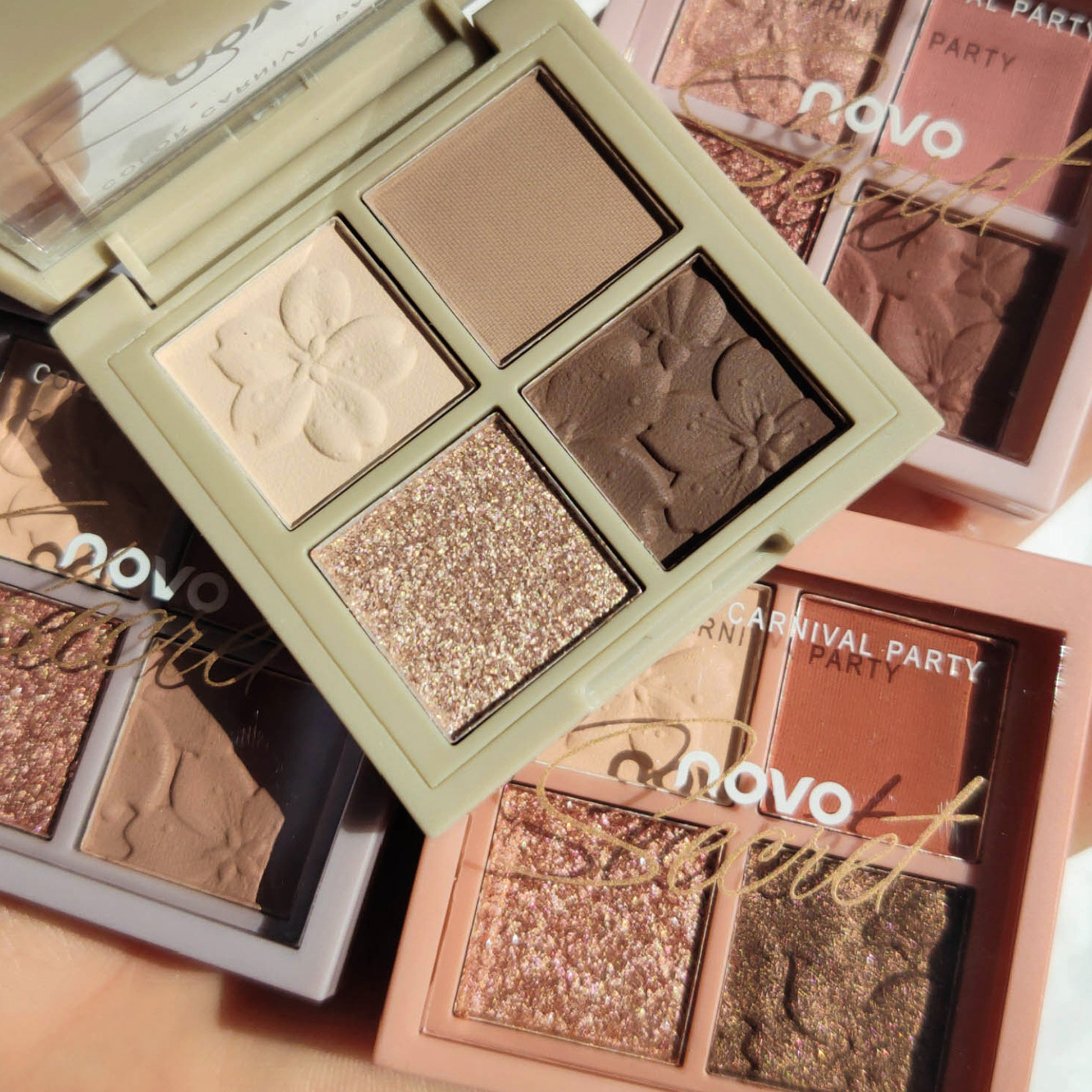 NOVO four-color earth color eye shadow plate ins Super Fire Eye Shadow flash powder Pearl waterproof parity student small plate portable