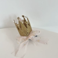 Золотая заколка для волос с бантиком