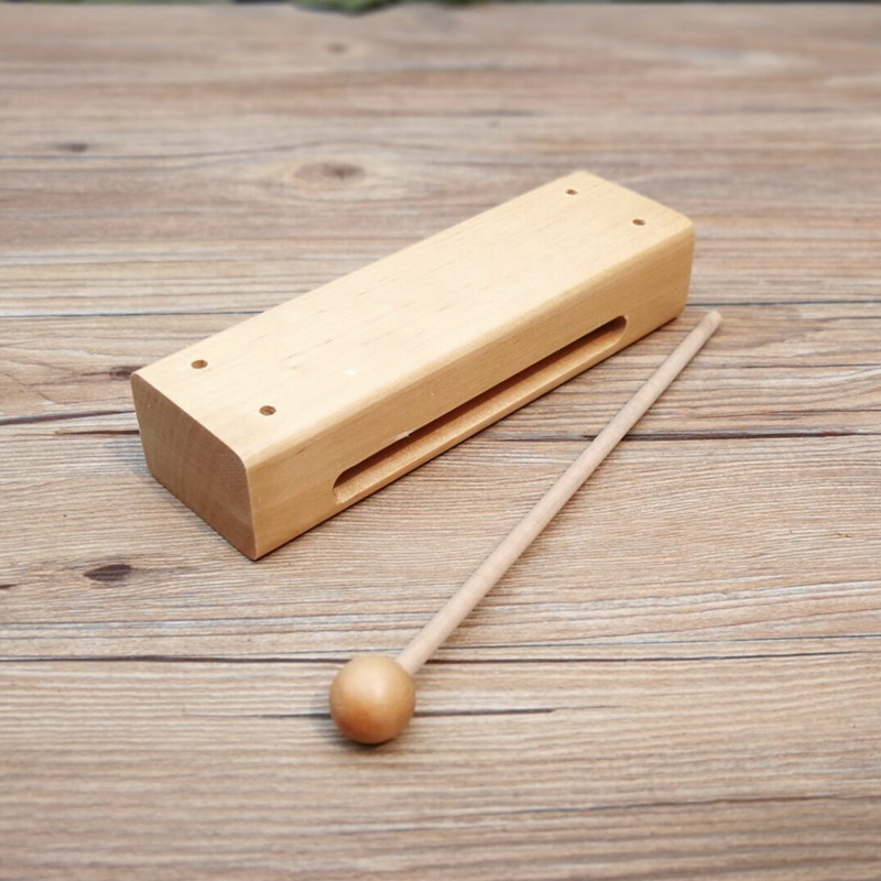 Orff bộ gõ gỗ cứng vuông xúc xắc mẫu giáo giáo dục sớm giáo dục âm nhạc hỗ trợ trẻ em đánh bại đồ chơi đồ chơi cho bé sơ sinh