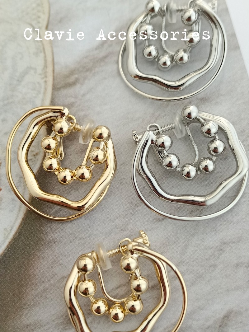 Niche designer du's new small circle earrings handmade three circles stacked with gold and silver ear clips without ear holes for women