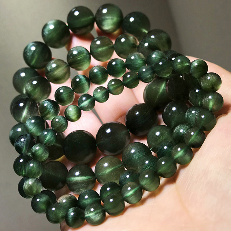 Boutique natural green hair crystal bracelet Men and women full hair Shunfa Cat's eye ghost crystal hand string Cat's eye slate titanium crystal