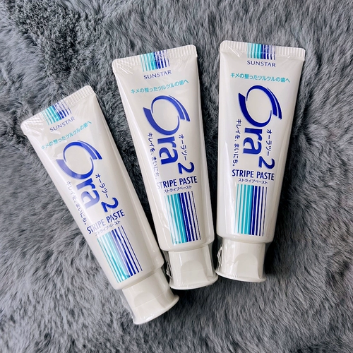 Японские ora2 -haol ленты зубные полосы Ярко -белая зубная паста с низким содержанием пузырьков 140 г антиариогинги, содержащие фторин и черный мятный вкус