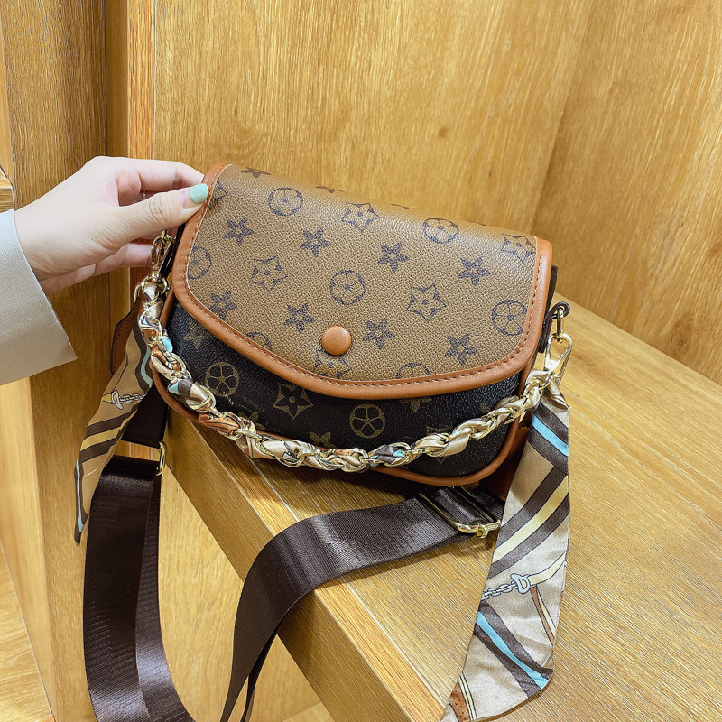 Small bag woman 2022 new Japan-ROK fashion hand women's handbag printed slanted satchel bag genuine leather single shoulder saddle bag