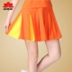 Апельсиновая миниатюрная юбка