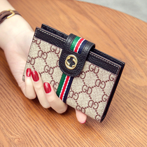 2021 New European and American leather wallet women buckle short folding cowhide wallet thin card position wallet wallet