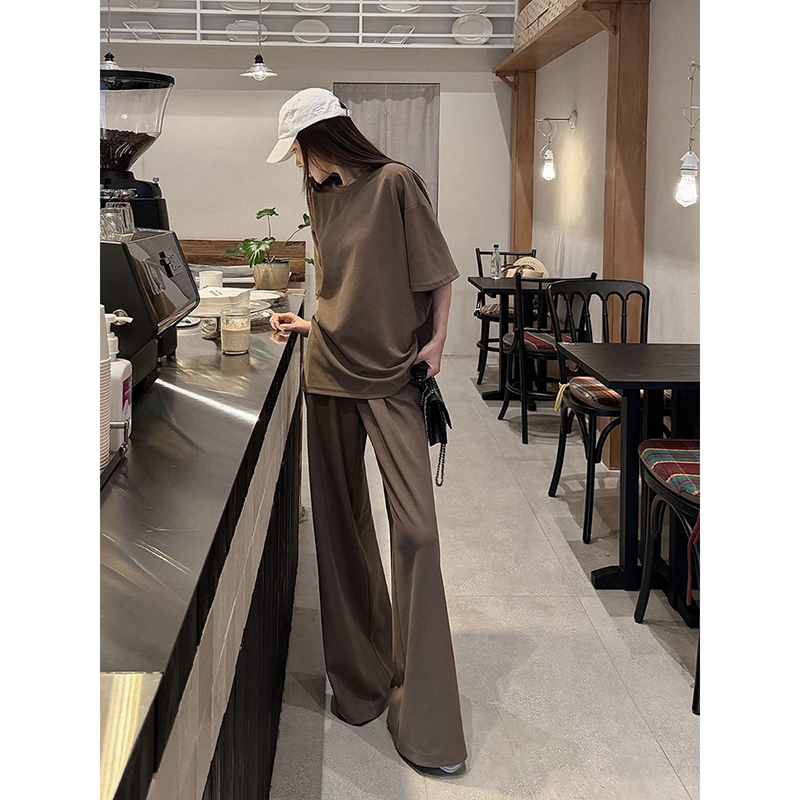 High-End Casual Sports Suit for Women in Summer, Loose and Slimming, Lazy Style Short-Sleeved Large T-Shirt, Wide-Leg Pants Two-Piece Set High-End Casual Sports Suit for Women in Summer, Loose and Slimming, Lazy Style Short-Sleeved Large T-Shirt, Wide-Leg Pants Two-Piece Set