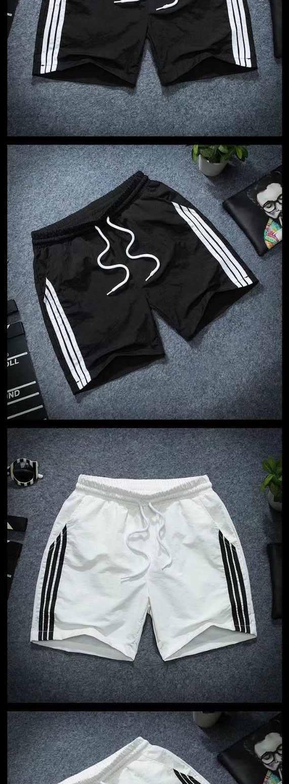 Quần short bé trai cotton mùa hè lỏng lẻo cộng với phần mỡ mỏng trong thủy triều quần vải nam