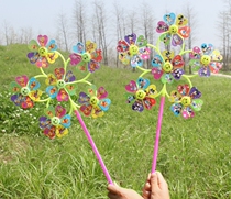 Six-wheeled cartoon windmill decorative windmill Childrens educational toys Colorful smiley windmill hot stall supply