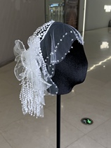 Mego original hand-stitched beaded Baotou tassel bridal headwear sample photo shoot outdoor modeling photo travel shoot