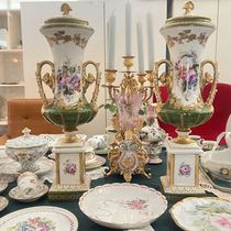 Deposit: 5980 in total a pair of Limoges green hand-painted large vases with two ears