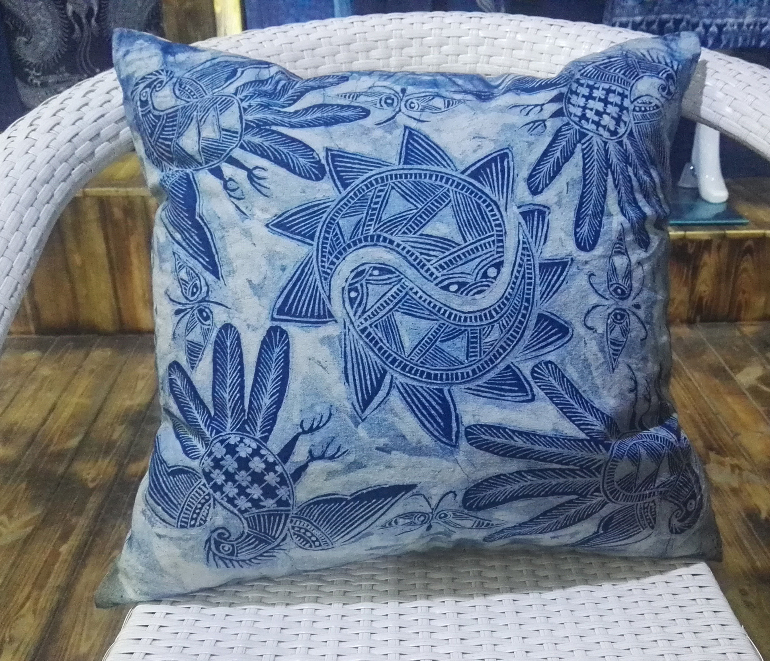 Tanzhai batik with pillows resting against the pillows of the pillows of the pillows of the pillows and of the mookiga batik.