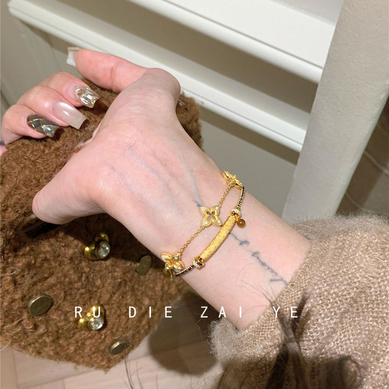 Like a Butterfly in the Wild, the Vintage Braided Bracelet with Five-Layered Tiger's Eye Stone and Black Gold Weaving Creates a Retro and High-End Feel for Women