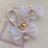 Оригинальный брелок с бантиком из жемчуга