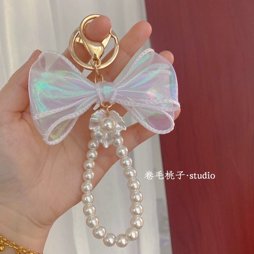 Оригинальный брелок с бантиком из жемчуга