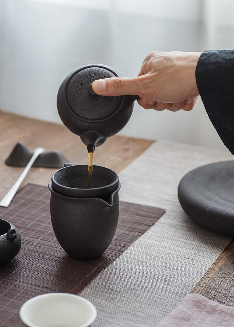 And creation of Japanese zen coarse pottery fair keller of black kung fu tea set And a cup of tea tea tea points exchanger with the ceramics sea