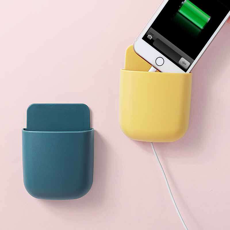 Punch wall-free paste rack mobile phone bed head-shaft remote control debris collection box line hole