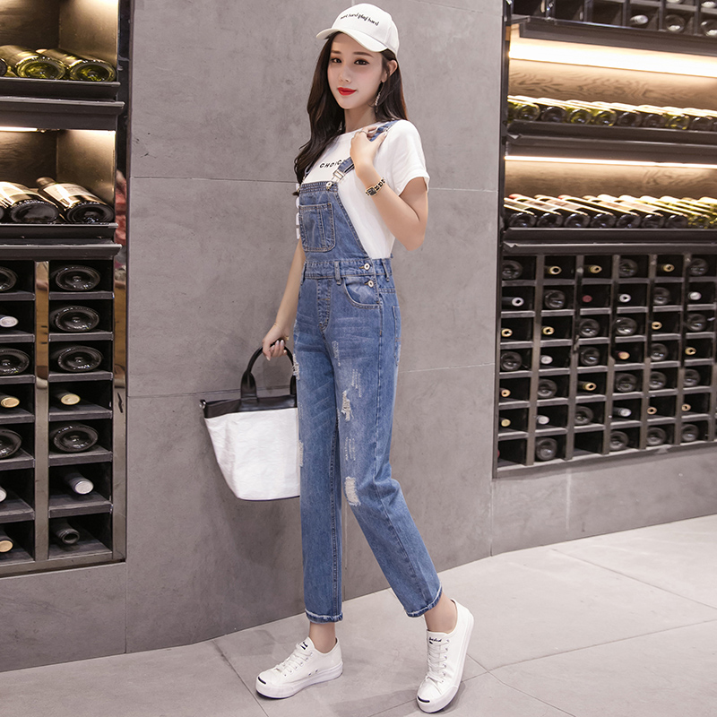 2020 mùa xuân và mùa thu denim mới quần dây đeo lỏng lẻo sinh viên bf đi lén lỗ hai mảnh bộ sling jumpsuit chín điểm