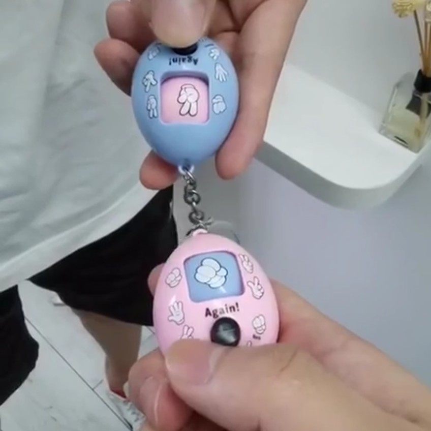 Douyin explosion model net red rock scissors cloth egg keychain guessing boxing egg game twisted egg machine divergence terminal machine