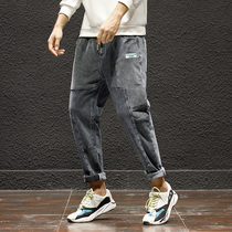 Hong Kong Chauder splicing light core suede jeans Mens Korean version 100 hitch loose small mark elastic small foot casual Harun pants