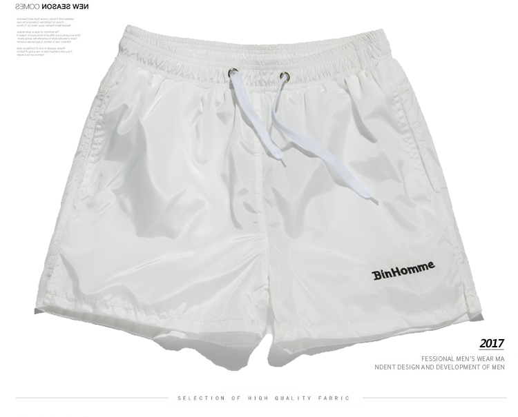 Quần short thể thao nam chạy ba quần của nam giới nhanh chóng làm khô 3 điểm quần short đơn giản màu sắc hoang dã vài bãi biển quần triều quần gió thể thao nam