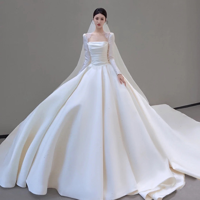 Long -sleeved satin wedding dress 2024 new bride atmosphere, simple super immortal French dragging door main gauze high -level sense Long -sleeved satin wedding dress 2024 new bride atmosphere, simple super immortal French dragging door main gauze high -level sense