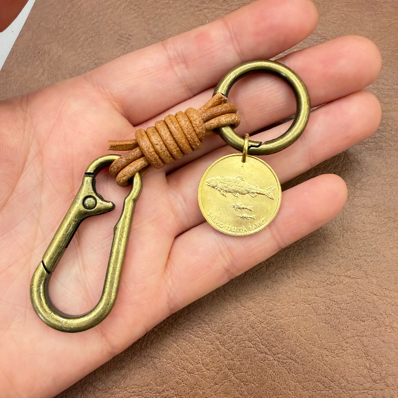 Have Fish Money in Your Hand, a Small Red Book-Style Slovenian Fish Coin Pendant Made of Genuine Leather Have Fish Money in Your Hand, a Small Red Book-Style Slovenian Fish Coin Pendant Made of Genuine Leather
