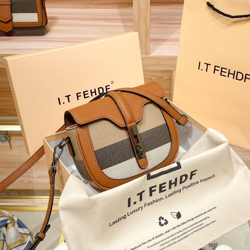 Hong Kong Genuine Leather Plaid Semi-Circular Saddle Bag for Women 2026 New Fashion Spring and Summer High-End Niche Crossbody Bag for Women