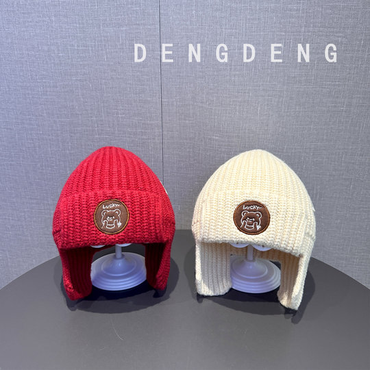 Children's hats in autumn and winter thickened warm knitted ear protection hats for boys and girls cute fashionable windproof woolen hats trendy