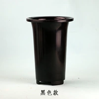 Черный цветочный горшок, орхидея