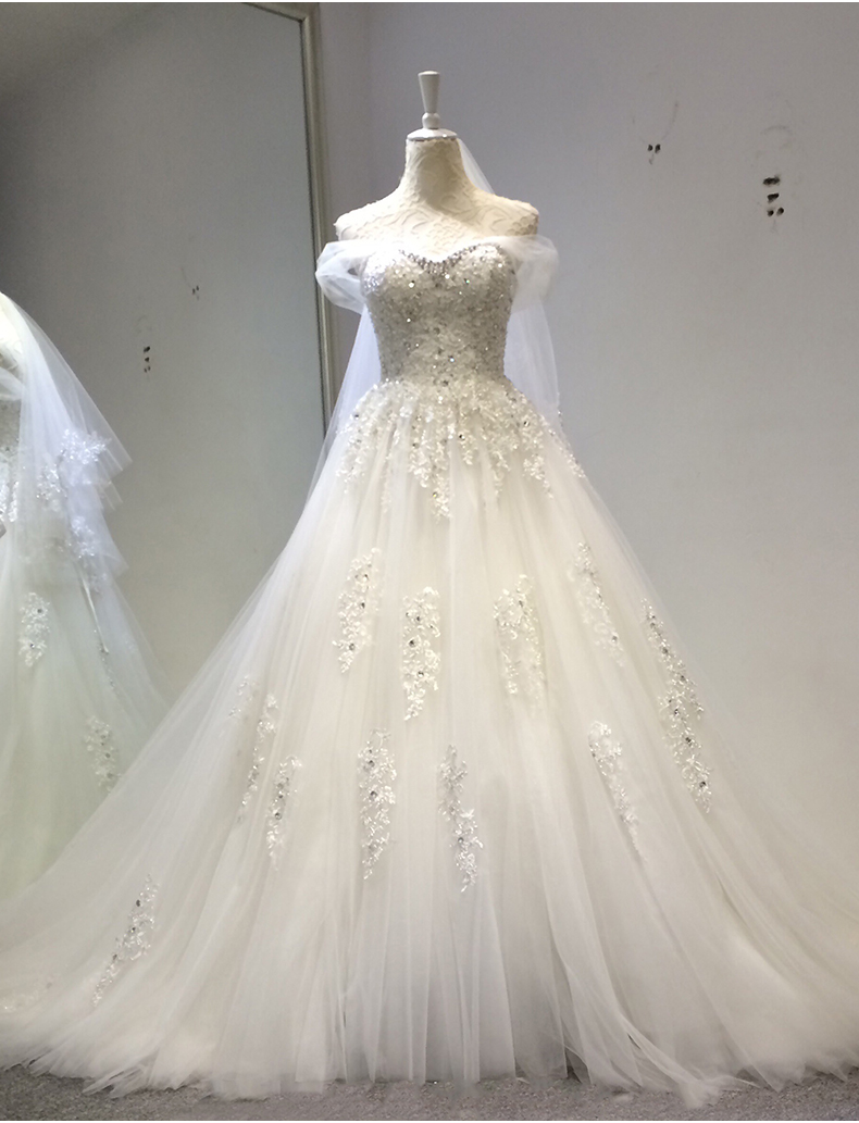 Lace wedding dress for bride, 2023 collection, open shoulders, fitted Lace wedding dress for bride, 2023 collection, open shoulders, fitted