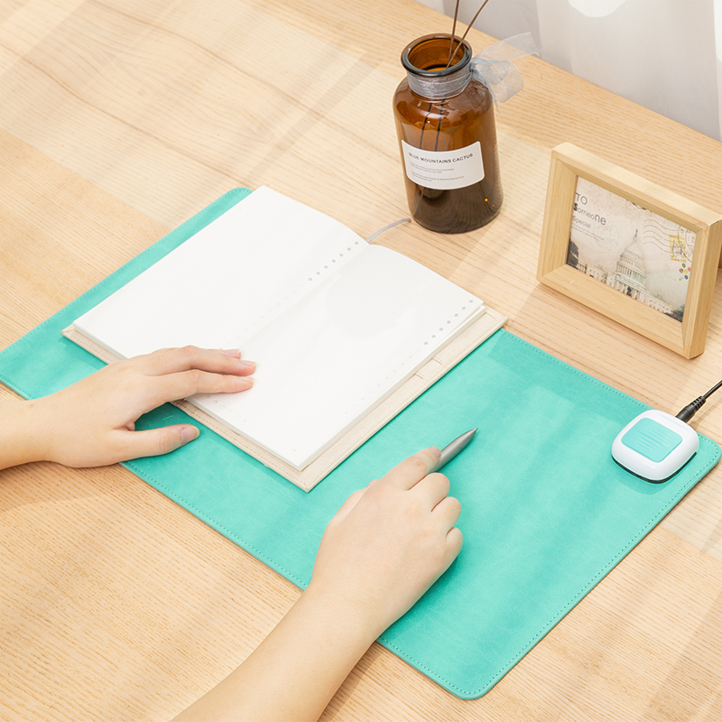 The heating desk of the desktop heating table and the mouse mat student write board heating the handcushion safe 3c pure color