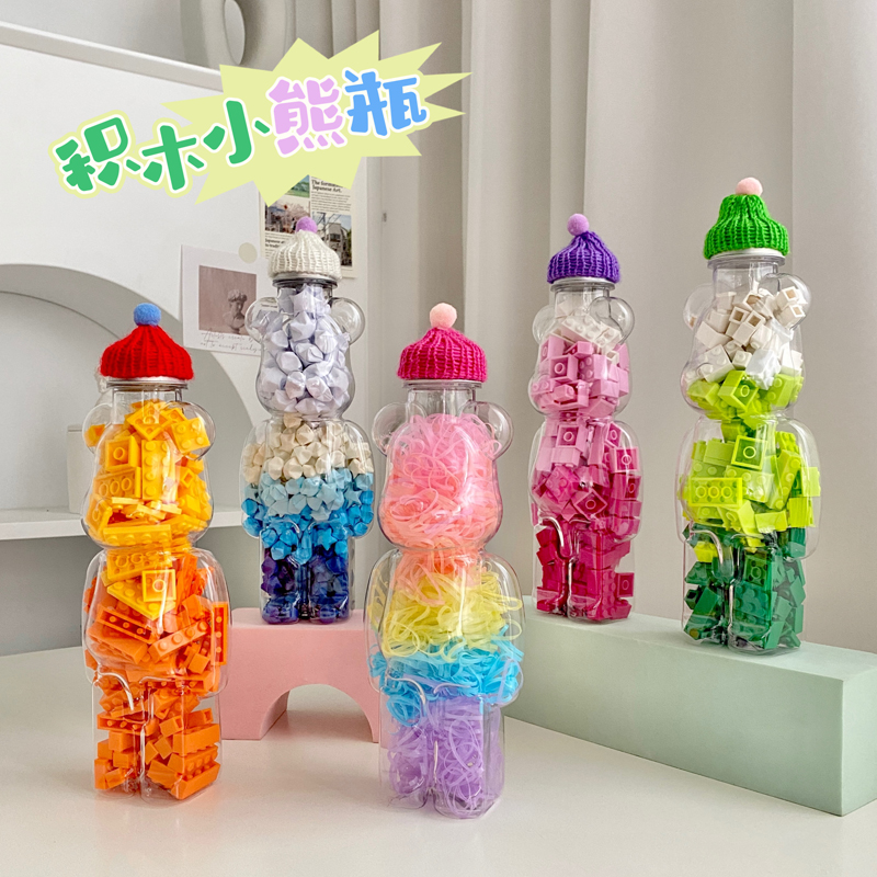 Building block storage box Lego parts loaded with tiny particles bottle net red violent bear ornaments desktop toy classification artifact