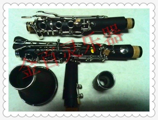 19 20 - key B - tube clarinet clarinet black tube instrument beginning examination professional playing