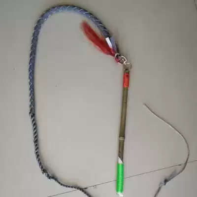 The sheep with the amenities sheep of cattle drive carriage of cattle sheep whip artifact old mu penis and testis of a sheep grazing