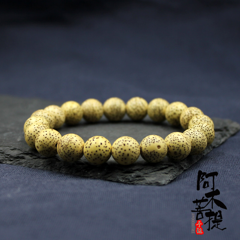 Hainan Xingyue Bodhi gold seed original ecological sub-bead gold seed chicken oil yellow single circle high density first month bracelet