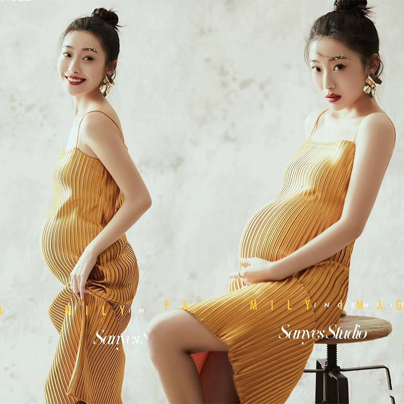 21 New pregnant women photograph the dress photograph of the new yellow small fresh sling dress photography camera fashion
