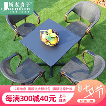 Cafe outdoor balcony table and chair coffee table three-piece set indoor and outdoor casual single courtyard small rattan chair combination