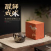 Kung Fu tea set gold and silver mixed with black lion dance ball