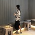 Bộ đồ mùa thu nữ 2018 mới cổ áo tam giác bò dài tay + váy xẻ nửa sơ mi trắng nữ Áo sơ mi