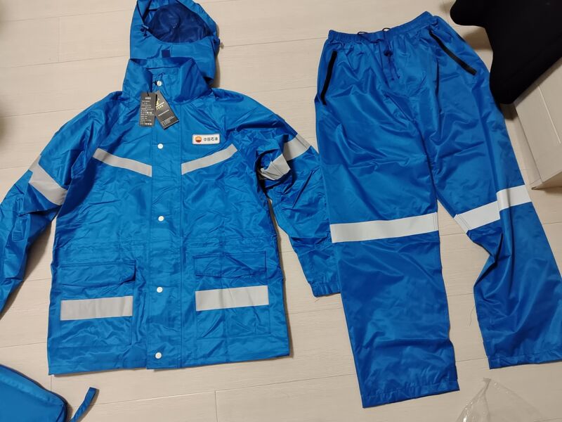 Brand New Petrochina Workwear Raincoat with Reflective Strips on the Front and Back Brand New Petrochina Workwear Raincoat with Reflective Strips on the Front and Back