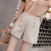 Quần short len ​​nữ mùa thu đông 2018 phiên bản mới của Hàn Quốc hoang dã eo cao sang trọng là quần lửng ống rộng thoải mái bên ngoài mặc quần bốt