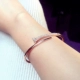 Thưởng thức phiên bản Hàn Quốc của trang sức Thời trang cá tính móng tay nhân tạo rhinestone vòng đeo tay mở phụ kiện vòng đeo tay nữ khí chất phiên bản Hàn Quốc - Vòng đeo tay Cuff vòng đá mắt hổ