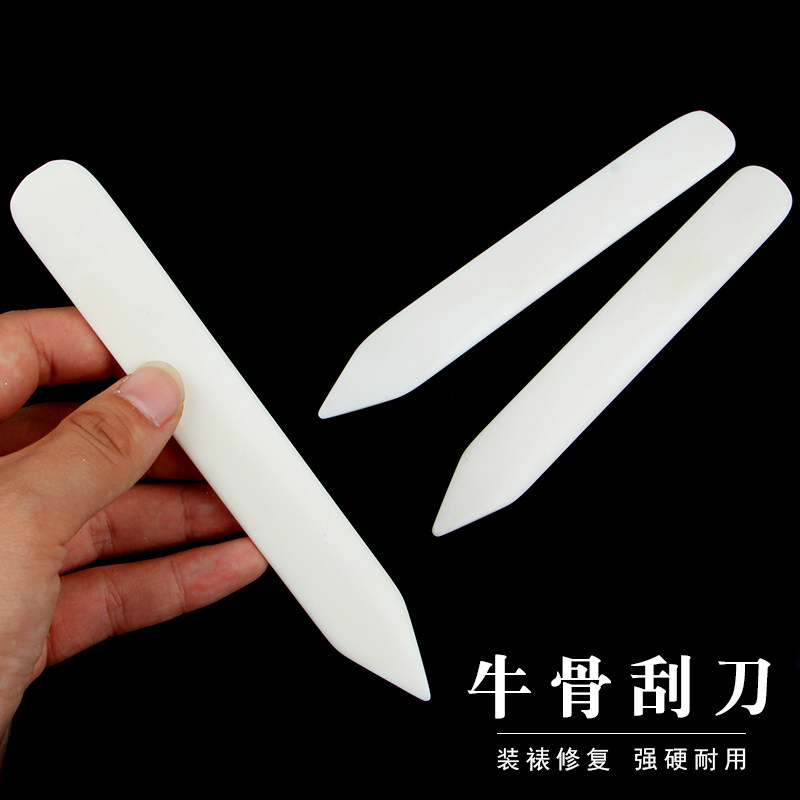 Natural cow bone scraper framed repair tool origami