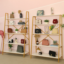 Nordic shoe store creative shoe rack wrought iron golden shoe store shoe rack bag display rack shoe store decoration renderings